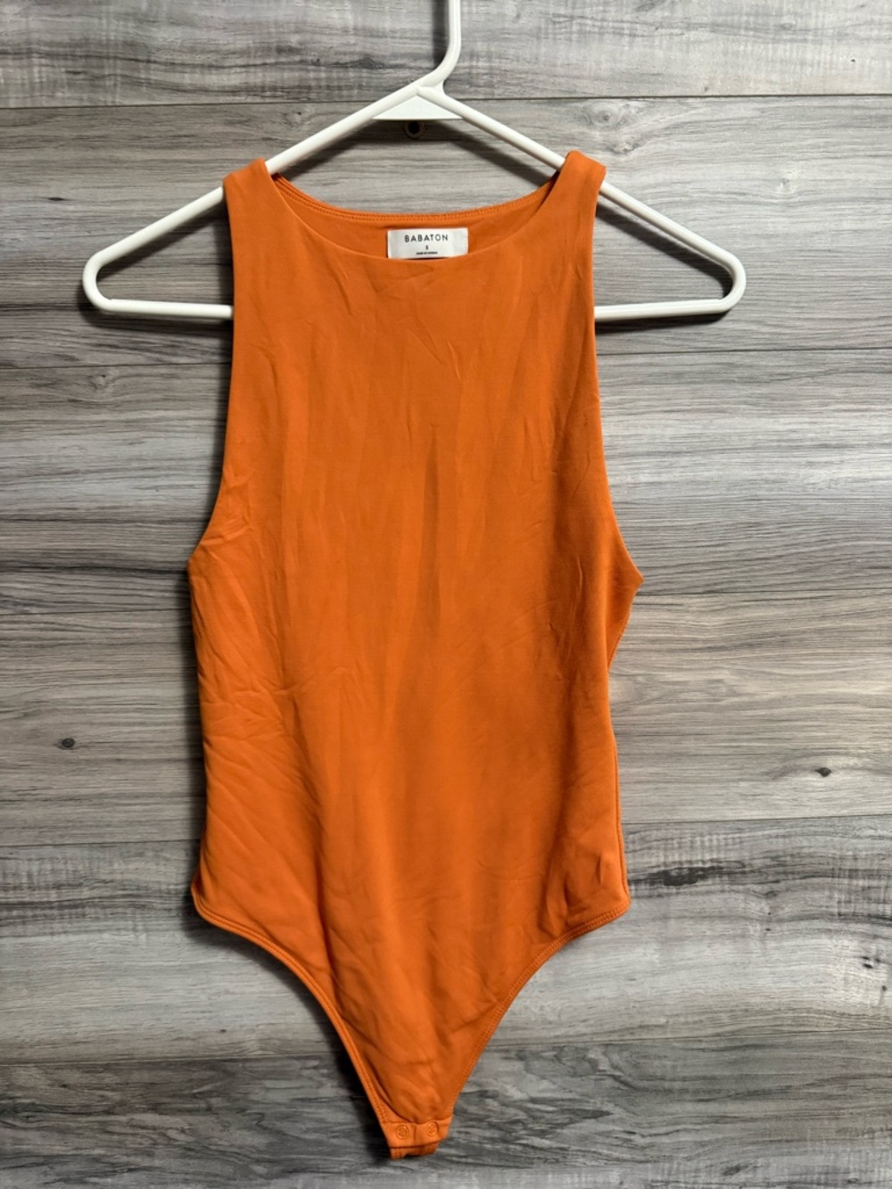 Babaton Aritzia orange thong bodysuit